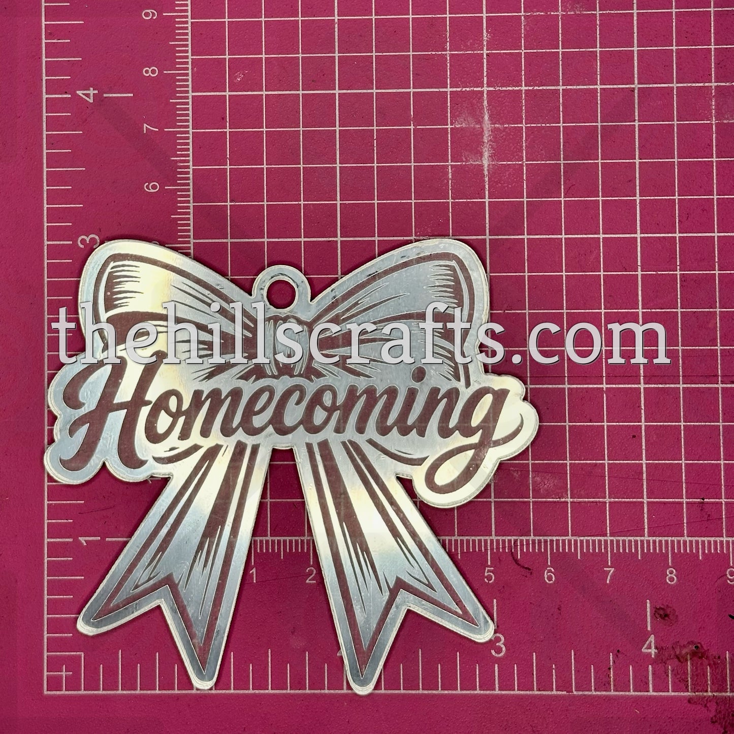 Homecoming word on Bow - Homecoming Trinket